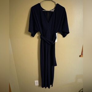 Brand new BB Dakota belted navy jumpsuit. Size XXS. Wide leg but not flare
